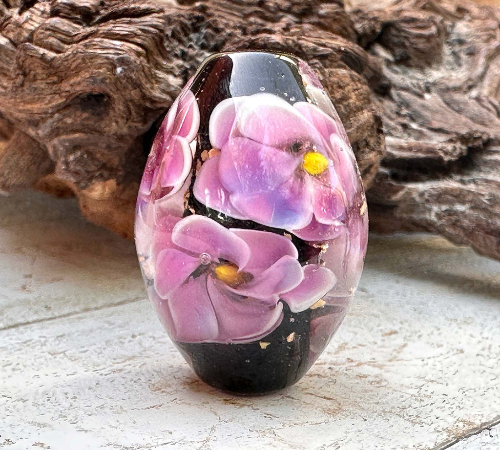 purple floral lampwork bead